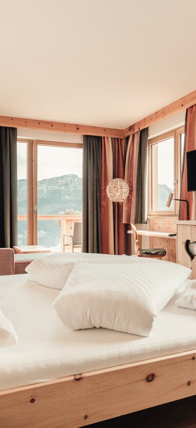 Blick in ein gemütliches Zimmer im Natur- und Wellnesshotel Höflehner | © Natur- und Wellnesshotel Höflehner