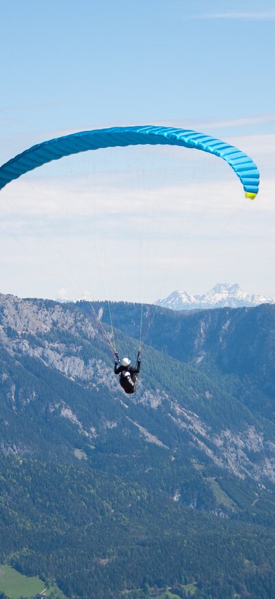 Paragleiten auf der Planai und Hochwurzen | © Alexander Klünsner Ein Paragleiter in der Luft | © Alexander Klünsner