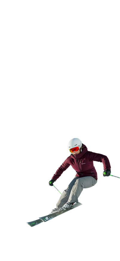 Eine Skifahrerin in Carvingposition | © Peter Burgstaller