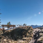 Pausing on a bench on the way to Rossfeld